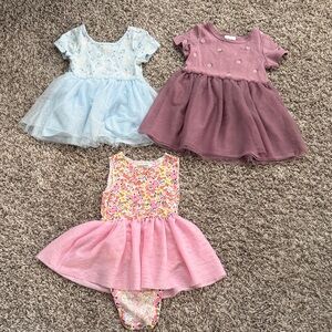 Set of Three Baby Dresses in Blue, Purple, and Pink